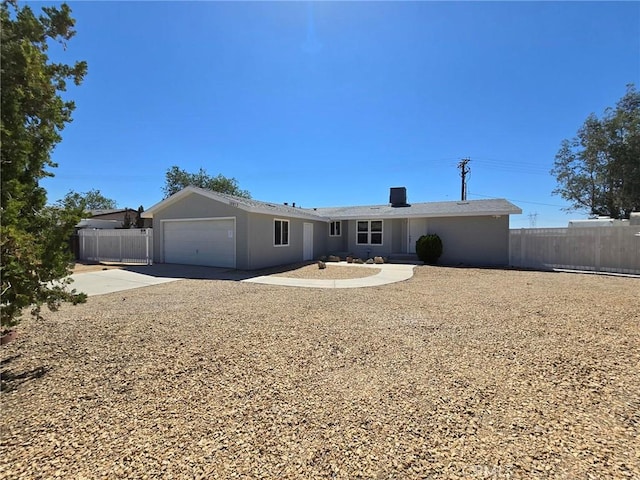 18812 Arbor Ct, Adelanto, CA 92301 - back of property featuring a garage and concrete driveway
