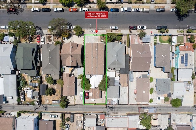 795 E 42nd Pl, Los Angeles, CA 90011 - aerial view of property's location with property boundaries highlighted and nearby suburban area