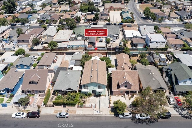 795 E 42nd Pl, Los Angeles, CA 90011 - aerial overview of property's location with nearby suburban area