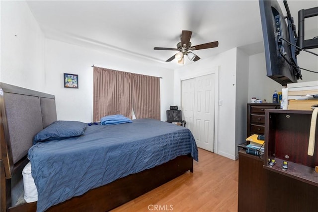 795 E 42nd Pl, Los Angeles, CA 90011 - bedroom with wood finished floors, a closet, and ceiling fan
