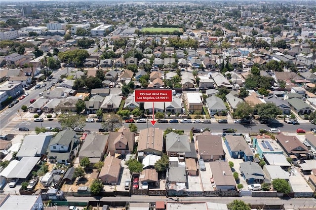 795 E 42nd Pl, Los Angeles, CA 90011 - aerial view of property and surrounding area with nearby suburban area