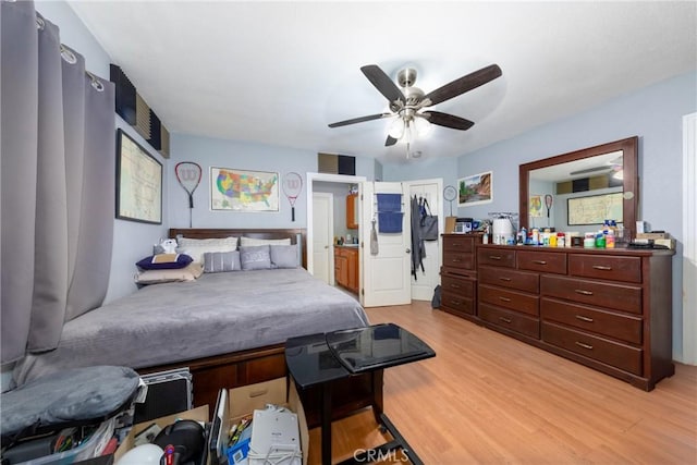 795 E 42nd Pl, Los Angeles, CA 90011 - bedroom with light wood-style floors and a ceiling fan