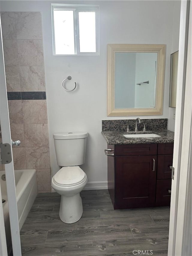350 E 223rd St, Carson, CA 90745 - full bath with vanity, wood finished floors, and bathtub / shower combination