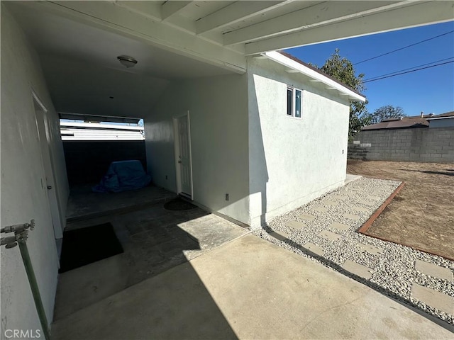 350 E 223rd St, Carson, CA 90745 - property entrance with stucco siding and a patio