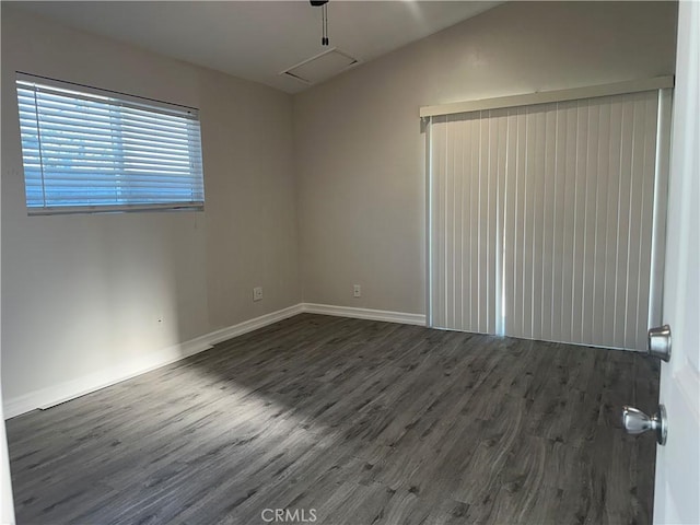 350 E 223rd St, Carson, CA 90745 - empty room featuring wood finished floors and vaulted ceiling