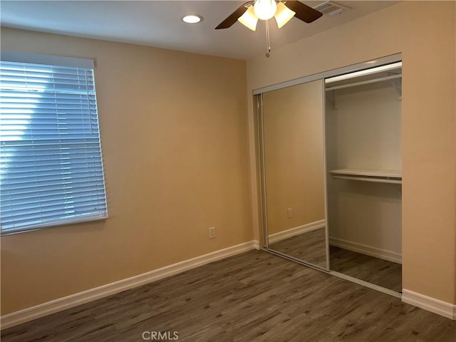 350 E 223rd St, Carson, CA 90745 - unfurnished bedroom with wood finished floors, a closet, recessed lighting, and a ceiling fan
