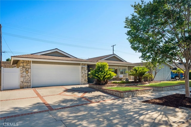 6152 Anthony Ave, Garden Grove, CA 92845 - single story home featuring stone siding, driveway, and an attached garage