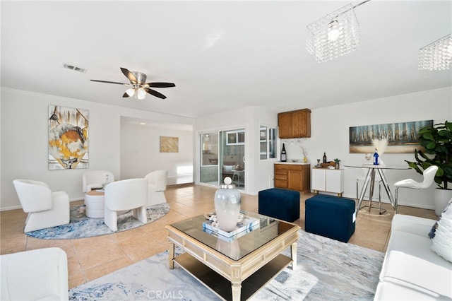 6152 Anthony Ave, Garden Grove, CA 92845 - living room with ceiling fan, light tile patterned floors, and a chandelier