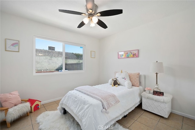 6152 Anthony Ave, Garden Grove, CA 92845 - tiled bedroom featuring baseboards and ceiling fan
