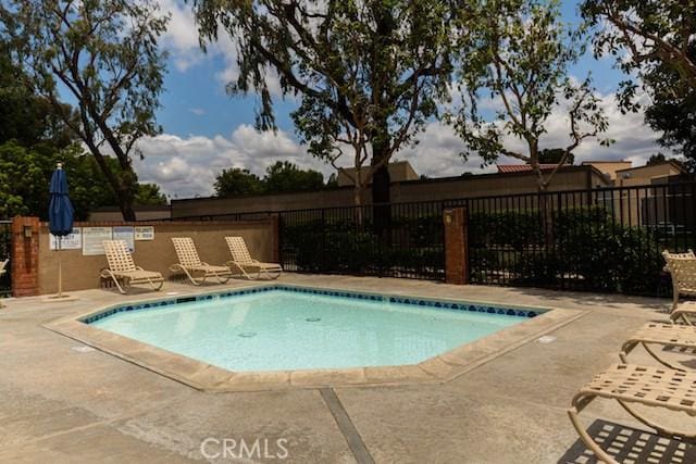 12 Ninos, Irvine, CA 92620 - view of swimming pool featuring a swimming pool and a patio