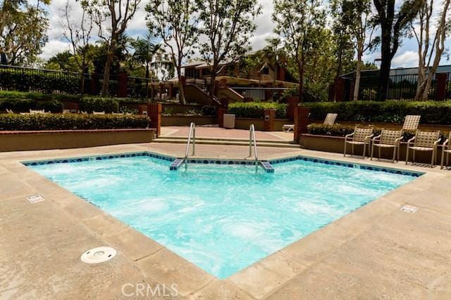 12 Ninos, Irvine, CA 92620 - view of swimming pool featuring a pool and a patio