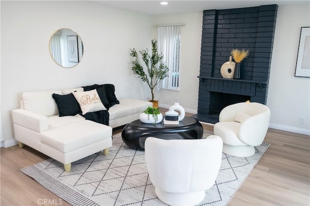 12 Ninos, Irvine, CA 92620 - living room with wood finished floors, recessed lighting, and a brick fireplace