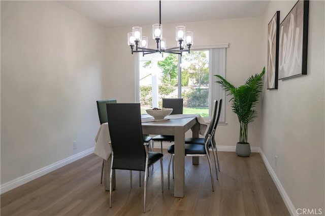 12 Ninos, Irvine, CA 92620 - dining area featuring a chandelier and wood finished floors
