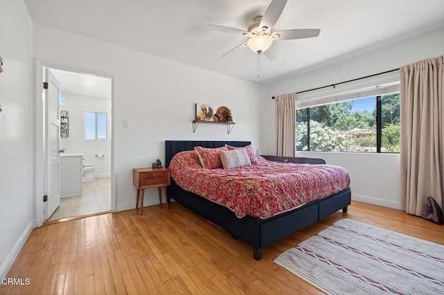 995 S La Luna Ave, Ojai, CA 93023 - bedroom featuring light wood-style flooring, multiple windows, ensuite bathroom, and ceiling fan