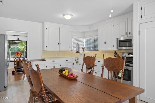 995 S La Luna Ave, Ojai, CA 93023 - kitchen featuring appliances with stainless steel finishes and white cabinets