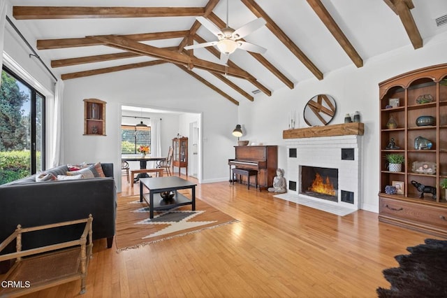 995 S La Luna Ave, Ojai, CA 93023 - living room featuring a fireplace, a ceiling fan, and light wood finished floors