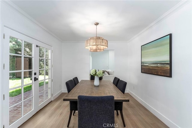 22608 Crespi St, Woodland Hills, CA 91364 - dining room with a chandelier, light wood-type flooring, and ornamental molding