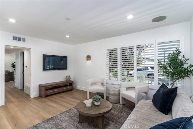 22608 Crespi St, Woodland Hills, CA 91364 - living area with light wood finished floors and recessed lighting