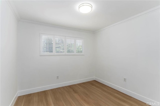22608 Crespi St, Woodland Hills, CA 91364 - spare room with light wood-type flooring and ornamental molding