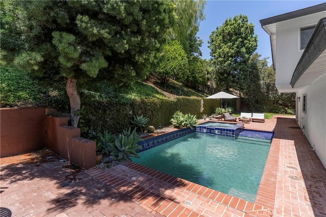 22608 Crespi St, Woodland Hills, CA 91364 - view of swimming pool with a pool with connected hot tub, a fenced backyard, and a patio