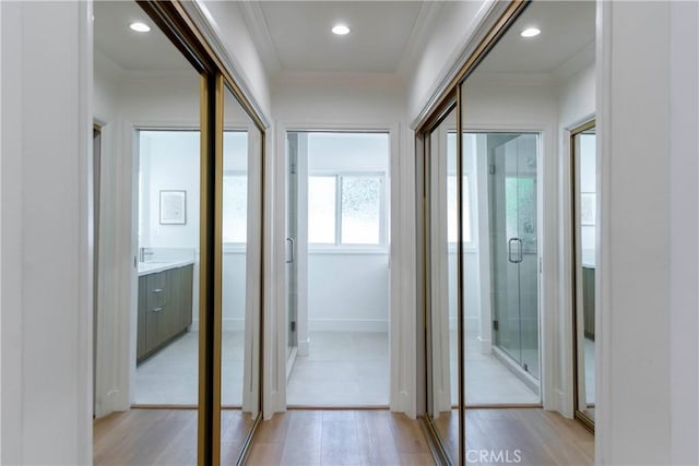 22608 Crespi St, Woodland Hills, CA 91364 - corridor with crown molding, light wood-type flooring, and recessed lighting