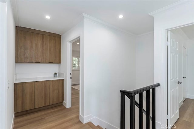 22608 Crespi St, Woodland Hills, CA 91364 - bar with light wood finished floors, crown molding, and recessed lighting