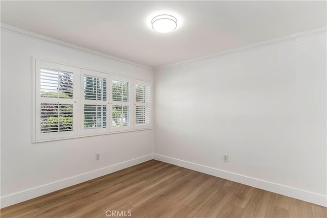 22608 Crespi St, Woodland Hills, CA 91364 - spare room with crown molding and light wood-style floors