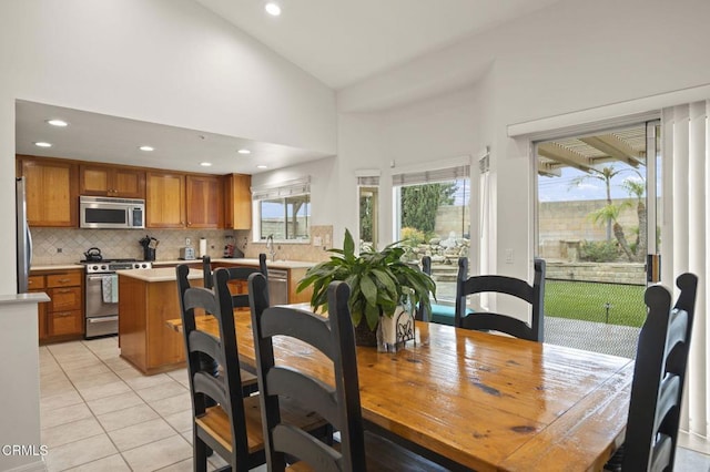 1531 Daphne Ave, Ventura, CA 93004 - dining room featuring light tile patterned floors, recessed lighting, and a towering ceiling