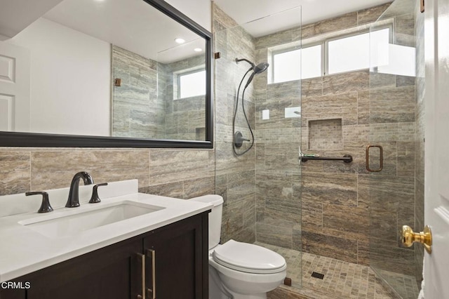 1531 Daphne Ave, Ventura, CA 93004 - full bathroom with vanity, a stall shower, tile walls, and recessed lighting
