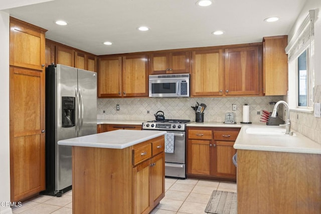 1531 Daphne Ave, Ventura, CA 93004 - kitchen with stainless steel appliances, light tile patterned floors, tasteful backsplash, light countertops, and recessed lighting