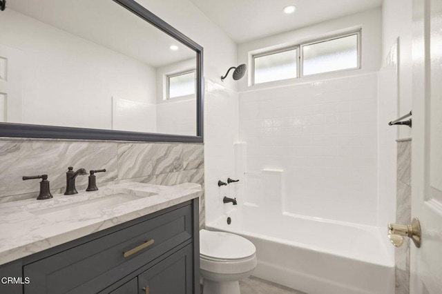 1531 Daphne Ave, Ventura, CA 93004 - bathroom with vanity, washtub / shower combination, tile walls, and recessed lighting