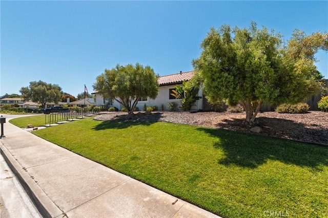 348 Clubhouse Dr, Santa Maria, CA 93455 - view of front of property with a front yard, stucco siding, and a tiled roof