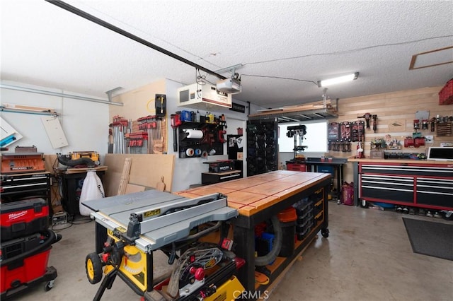 348 Clubhouse Dr, Santa Maria, CA 93455 - garage with a workshop area and a garage door opener