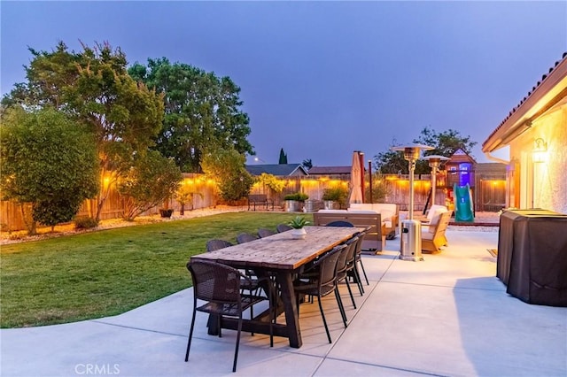 348 Clubhouse Dr, Santa Maria, CA 93455 - fenced backyard with a patio and outdoor dining area