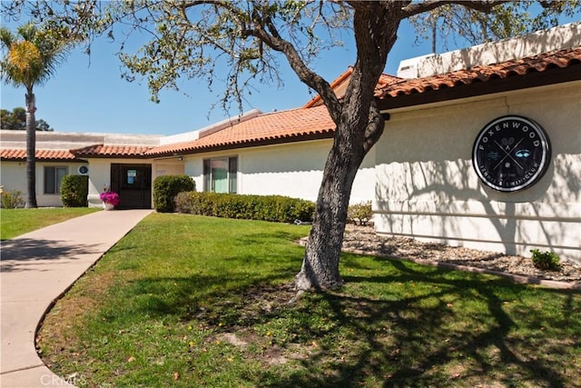 348 Clubhouse Dr, Santa Maria, CA 93455 - mediterranean / spanish-style home featuring stucco siding, a front lawn, and a tiled roof