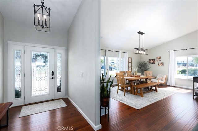348 Clubhouse Dr, Santa Maria, CA 93455 - entrance foyer with a chandelier, lofted ceiling, and dark wood-style floors