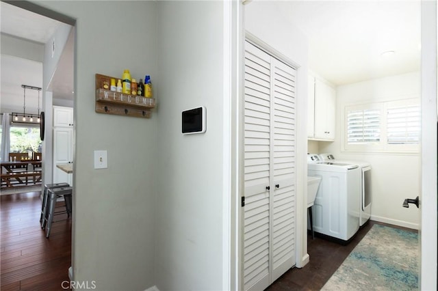 348 Clubhouse Dr, Santa Maria, CA 93455 - hallway with washing machine and clothes dryer, dark wood-style floors, and plenty of natural light