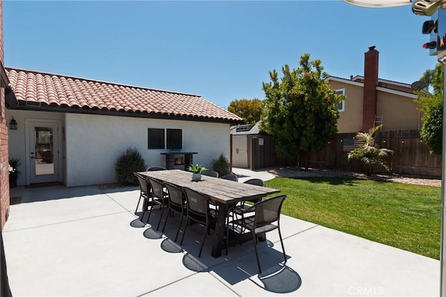 348 Clubhouse Dr, Santa Maria, CA 93455 - view of patio featuring a storage unit and outdoor dining area