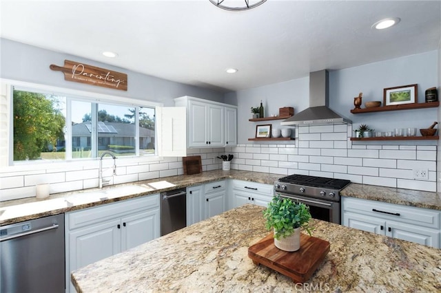 348 Clubhouse Dr, Santa Maria, CA 93455 - kitchen featuring wall chimney exhaust hood, open shelves, appliances with stainless steel finishes, white cabinetry, and decorative backsplash