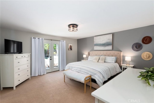 348 Clubhouse Dr, Santa Maria, CA 93455 - bedroom with french doors, access to exterior, and light carpet