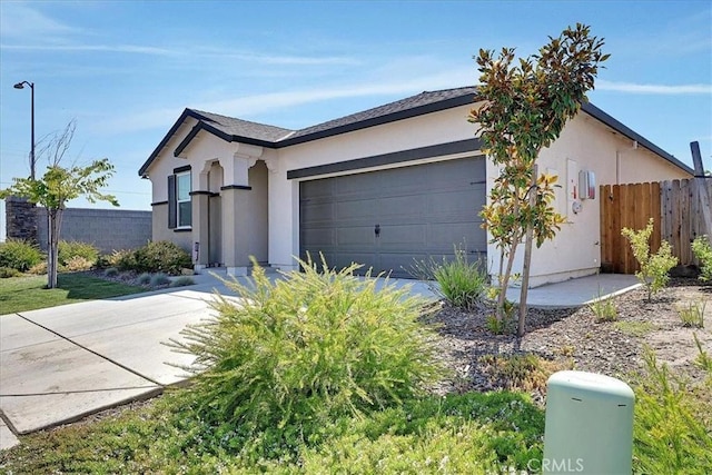 5516 Sunhaven St, Marysville, CA 95901 - view of front of home with a garage, stucco siding, and driveway