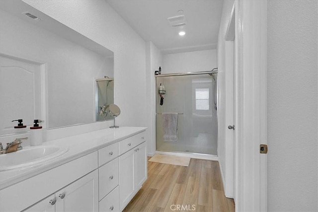 5516 Sunhaven St, Marysville, CA 95901 - full bath with a stall shower, vanity, and wood finished floors