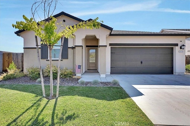 5516 Sunhaven St, Marysville, CA 95901 - view of front of home featuring stucco siding, a garage, and concrete driveway