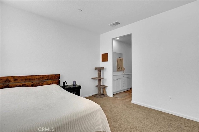 5516 Sunhaven St, Marysville, CA 95901 - bedroom with light carpet and ensuite bath