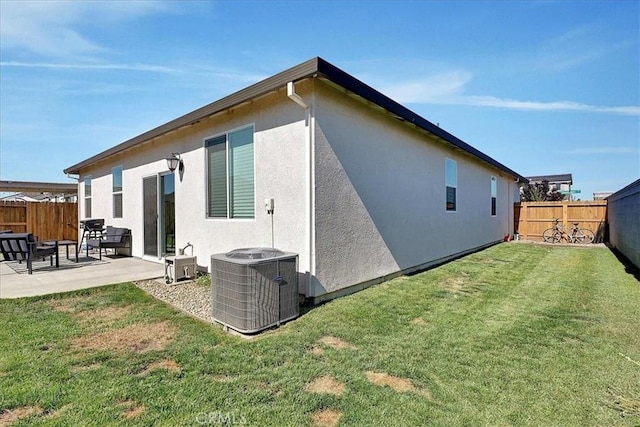 5516 Sunhaven St, Marysville, CA 95901 - rear view of house featuring a fenced backyard, a patio area, and stucco siding