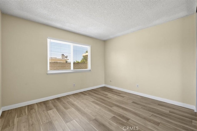 3262 Avenida Simi, Simi Valley, CA 93063 - spare room with wood finished floors and a textured ceiling