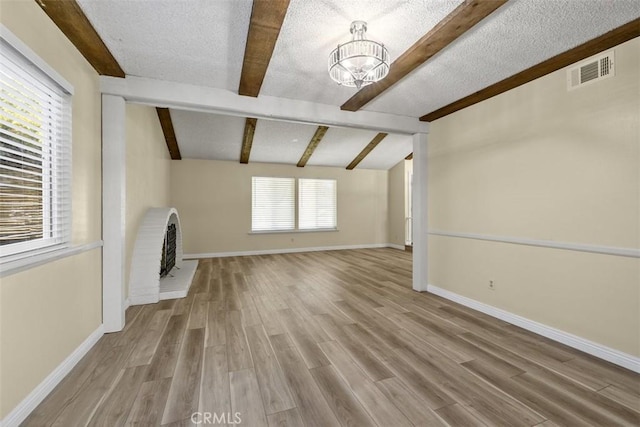 3262 Avenida Simi, Simi Valley, CA 93063 - unfurnished living room with wood finished floors, a chandelier, and a textured ceiling