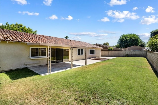 3262 Avenida Simi, Simi Valley, CA 93063 - rear view of house featuring a fenced backyard, a patio, a tiled roof, and stucco siding