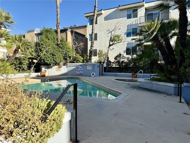 7640 Oso Ave Unit 316, Winnetka, CA 91306 - community pool featuring a patio