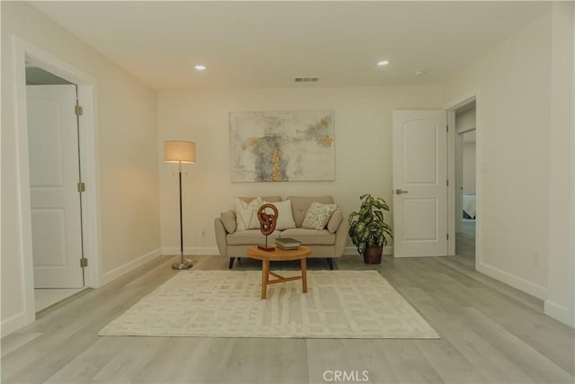 722 W Cully Dr, Orange, CA 92865 - living area featuring light wood finished floors and recessed lighting